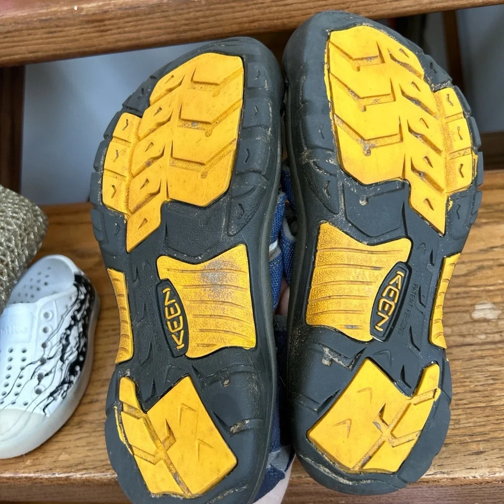 KEEN Kids' Newport H2 Sandals in a blue colorway hiking beach camp outdoors